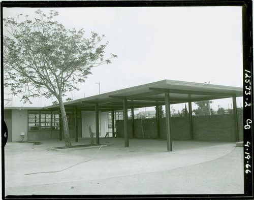 View of the community building and shade shelter at Obregon Park