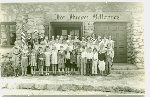 View of children in front of the William D. Davies Memorial Building at Charles S. Farnsworth Park