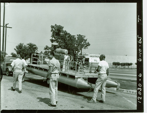 View of pool cleaning boat on trailer at Alondra Park