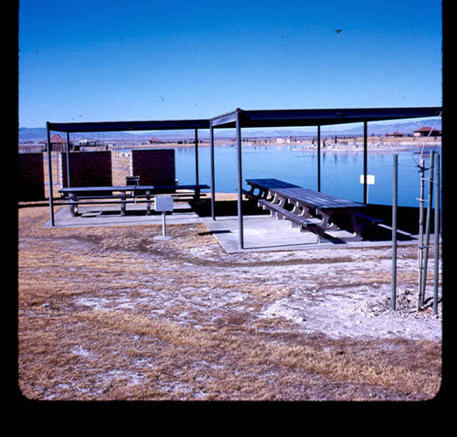 View of picnic shade shelters and lakes at Apollo Park