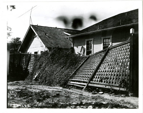 View of a blown down fence at Plummer Park