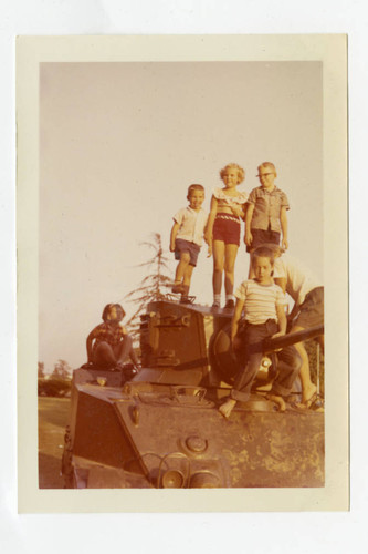 Poteet children on top of a tank at South Gate Park, South Gate, California