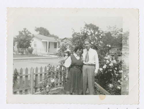 Maria and Ezequiel L. Andrade, Sr. in the front yard, Los Nietos, California