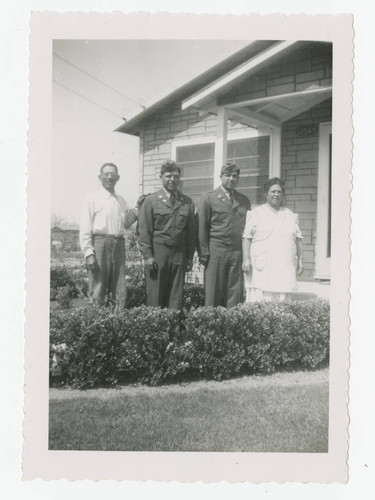 Barajas family with two sons in army uniforms, Los Nietos, California