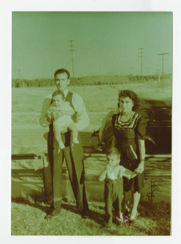 Eulogio and Carmen Cabral with their children Louis and Angel at their house, South Whittier, California