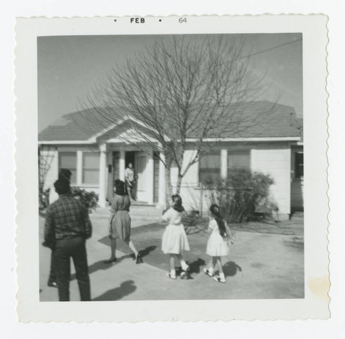 Felix family in front of house, Los Nietos, California