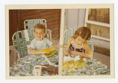 Siblings in backyard patio, South Whittier, California