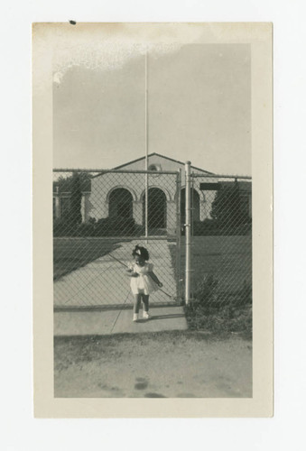 Lupe Borden in front of Los Nietos School, Los Nietos, California