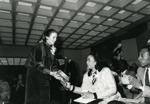 County Librarian Presents Gift to Coretta Scott King