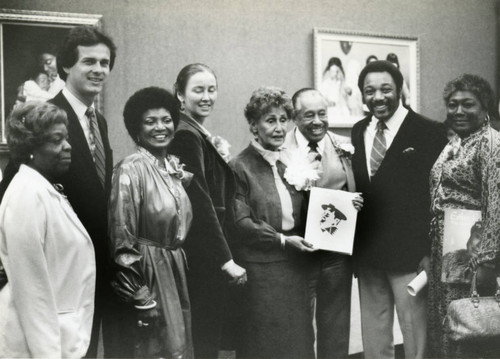 Honoree and Attendee Pose for Photo at African American Living Legends Program