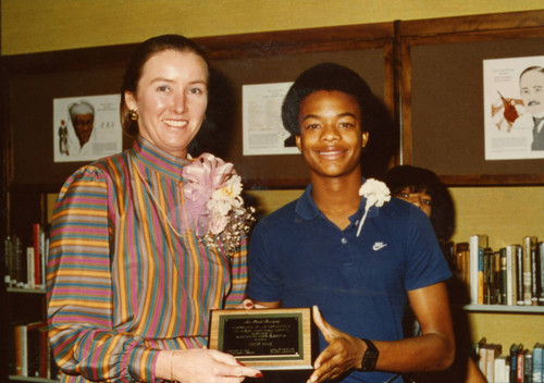 Todd Bridges Accepts Plaque during African American Living Legends Program