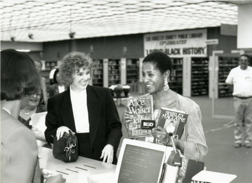 Marla Gibbs at the A C Bilbrew Circulation Desk