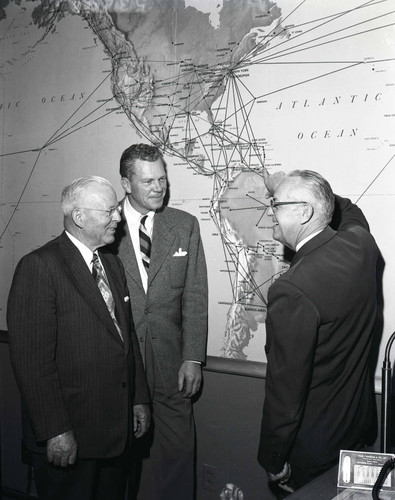 Men with large map