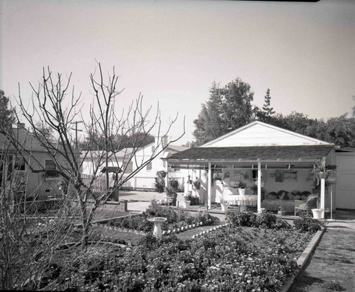 Side view of the house and gardens at 601 Ladera Street, Pasadena