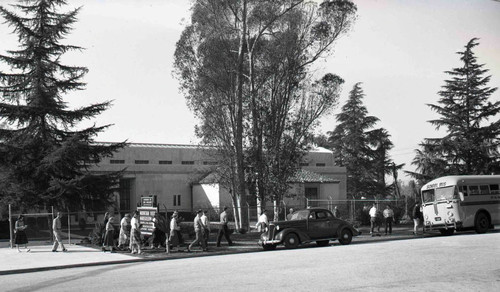 Group of young men and women in front of the Mountain View Mausoleum and Art Gallery