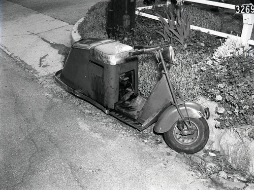 Motor scooter with damage