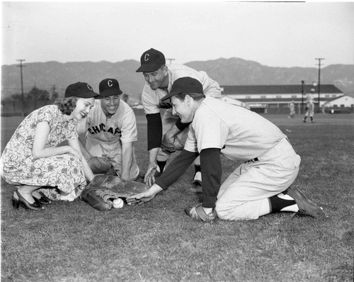 Three White Sox players and girl