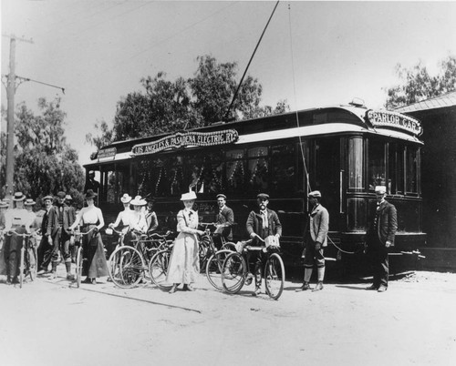 Pacific Electric Red Car "The Poppy" with bicyclists