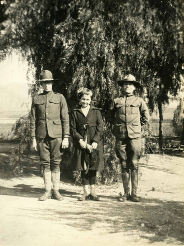 Harold in Army uniform with sister and childhood friend at family home in San Fernando, CA