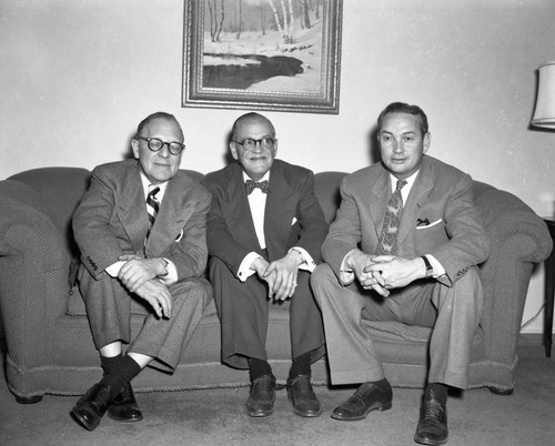 Three men relaxing