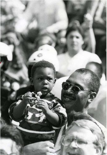 Holden Chris with son Nicholas during the 'Pasadena Welcomes the World Community Portrait and Celebration