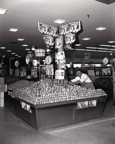 Grocery store display of apples