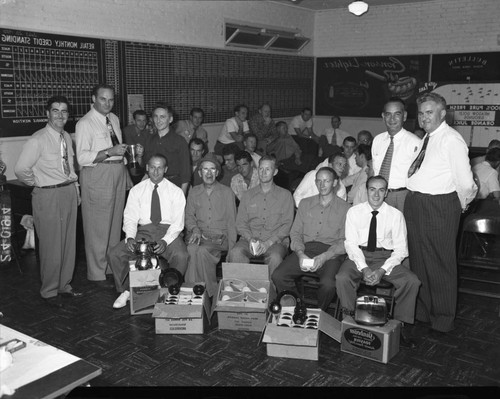 Group of salesmen with prizes