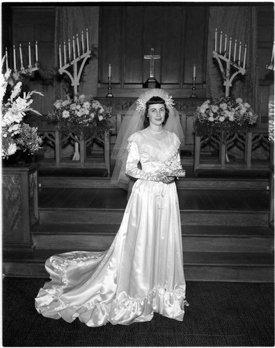 Mrs. Pfluke wearing her wedding dress