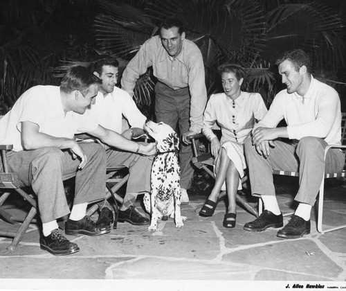 Young Men from Illinois Football Team with a Dog