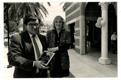 Rogerio de la Selva Holding an Award at the 1993 Woodbury University Awards Convocation