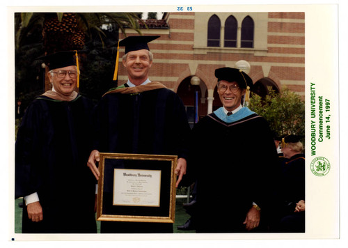 Richard King and Ken Nielsen Present Ronald Soderling With an Honorary Degree