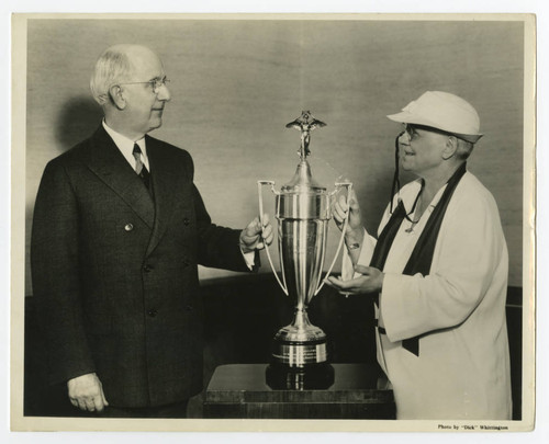 "Pop" Whitten Accepts Gregg Writer Trophy, circa 1944