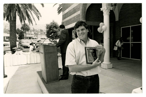 Peter Di Sabatino Holding an Award at the 1993 Woodbury University Awards Convocation