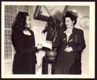 Nona Moffatt, President of Omega Sigman, presents a scholarship to a young woman, Berkeley (?), 1946