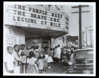 School children attending an afternoon movie at the Largo movie theater on 103rd St., Los Angeles, 1960