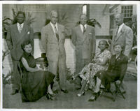 Dr. John A. Somerville and three couples standing in a yard, 1950s