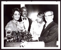 Vivian Osborne Marsh and three others at a formal event, 1950-1970