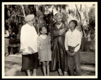 Fay Jackson and Dr. Vada Somerville with an unidentified girl and boy, 1940s-1950s