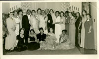 Dr. Wilbur Clarence Gordon and Cynthia Mitchell Gordon on their wedding day with guests at the Somerville home, Los Angeles, 1944-1945