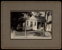 Jennie Bruington in front of her house on S. Berendo Street, Los Angeles (copy photo made 1930-1989)