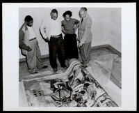 Unboxing of the "The Negro in California History" mural, by Charles Alston, at the Golden State Mutual Life Insurance Co., Los Angeles, 1949