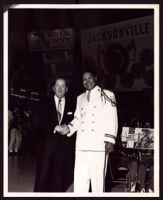 Kernaa D. McFarlin, band leader and unidentified white man, at the World's Fair, New York, 1964