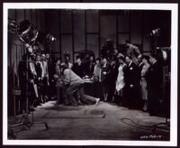 Actors stage a scene from "A House of Horror" for prominent citizens on a sound stage at Hollywood Productions, Los Angeles, 1939