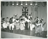 African Americans dancing on a stage with musicians, Los Angeles, 1940s-1950s