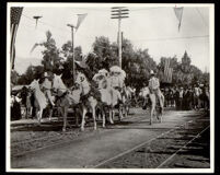 Four horse carriage carrying four young women at the Tournament of Roses parade, Pasadena, 1902