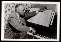 William Grant Still working on a composition in his home, Los Angeles, 1960-1970