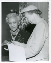 Dr. Vada Somerville conferring with Eleanor Roosevelt at a reception in the Somerville home, Los Angeles, 1950