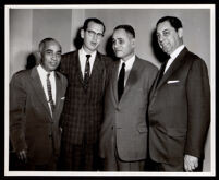 Ralph Bunche with three unidentified men, 1958