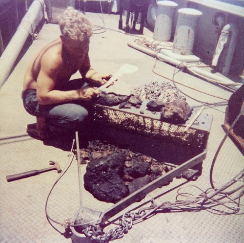 MidPac mountain range dredge haul. Manganese dioxide nodules, volcanic rock, and a long white flat coral sponge