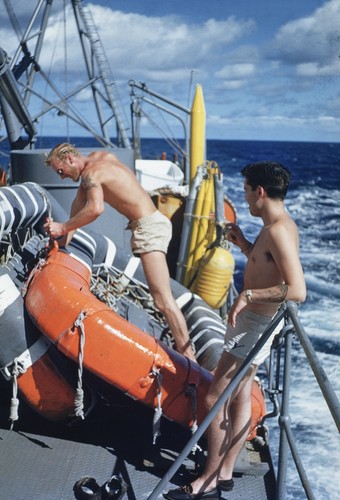 Men on deck R/V HORIZON with life rafts